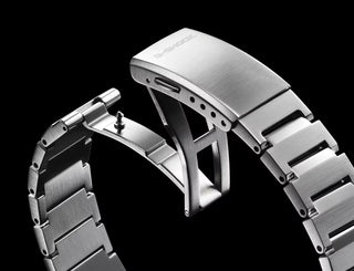 G-SHOCK GSTB1000D-1A watch with solid stainless steel band and bezel, Bluetooth connectivity, Tough Solar power, Carbon Core Guard, minimalist design, and multi-finish construction