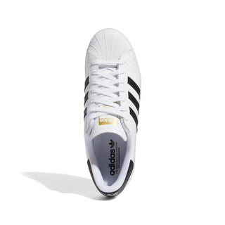 White Adidas sneaker with black stripes on a white background