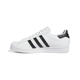 White Adidas sneaker with black stripes on a white background