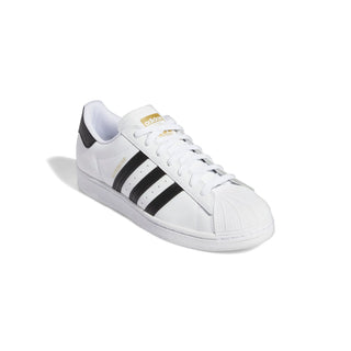 White Adidas sneaker with black stripes on a white background