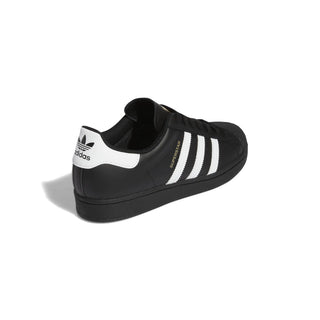 adidas Superstar in Black with a white background