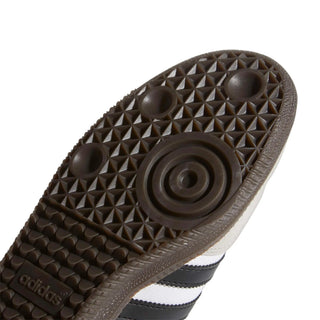 Close-up of Adidas sandal sole with textured pattern on a white background