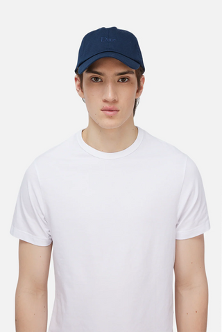 Navy Dime low profile cap with tonal embroidery and curved brim