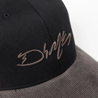 Black Dime full fit cap with raised scribble logo and corduroy brim