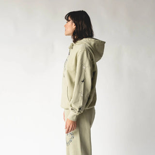 Moss-colored Welcome Skateboards hoodie with halo prints, pouch pocket, and elastic ribbing.