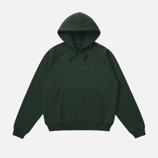 Front view of Dime Cursive Logo Hoodie in Mountain Green with tonal embroidered chest logo, drawstring hood, and kangaroo pocket
