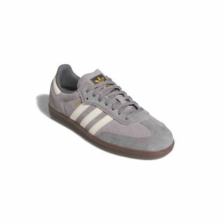 Gray Adidas sneaker with white stripes on a white background