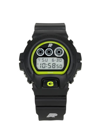G-SHOCK DW6900AP23-1 watch with fluorescent yellow accents on face and strap, symbolizing durability and versatility.