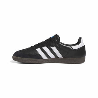 Black Adidas sneaker with white stripes on a light gray background