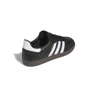 Black Adidas sneaker with white stripes on a white background