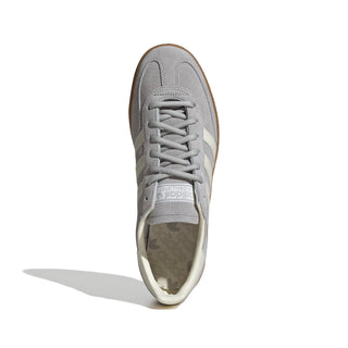 Gray sneaker with white sole on a white background