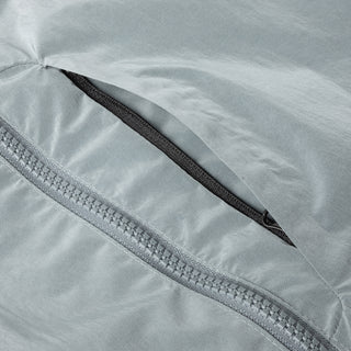 Glossy Dime Taffeta Windbreaker with zip pockets and reflective logo