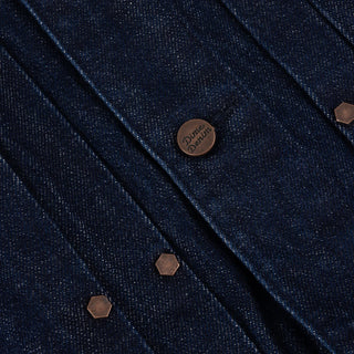 Dime Pleated Denim Jacket in Indigo — 100% cotton with front pleats, custom shanks, hexagon rivets, metal button closure, and woven label branding at hem