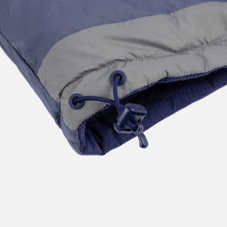 Front view of Dime Reversible Insulated Jacket in Blue Iris with a geometric quilted pattern, hood, zippered pockets, chest logo, and hem cinches