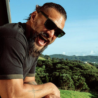 Electric Eyewear Jason Momoa-inspired Knoxville sunglasses with eco-friendly frames and melanin-infused lenses. British Racing Green Frame.
