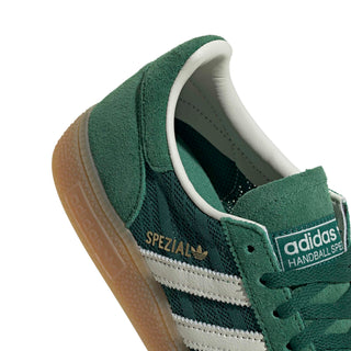 adidas Originals Handball Spezial in Collegiate Green/Off White/Blanch Green — soft suede and textile upper with rubber outsole, lace closure, and Trefoil tongue logo rooted in the iconic 1979 heritage.

