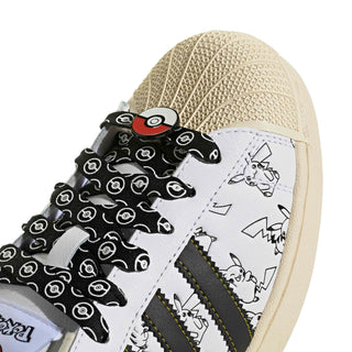 adidas Originals Pokémon Superstar II "Pikachu" in Footwear White/Core Black/Gold Metallic — leather upper with shelltoe design, Pikachu character visuals, Pokéball laces, Pikachu tail lace jewel, padded tongue and heel, rubber outsole