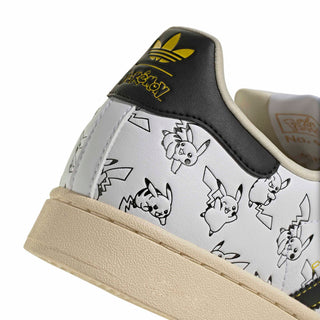 adidas Originals Pokémon Superstar II "Pikachu" in Footwear White/Core Black/Gold Metallic — leather upper with shelltoe design, Pikachu character visuals, Pokéball laces, Pikachu tail lace jewel, padded tongue and heel, rubber outsole