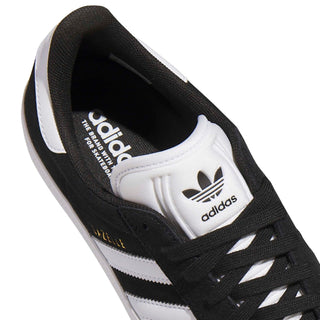 Adidas Gazelle ADV skate shoe in Core Black, Cloud White, and Gold Metallic — low-profile suede upper with cupsole construction and reinforced ollie zone.