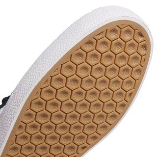 Adidas Gazelle ADV skate shoe in Core Black, Cloud White, and Gold Metallic — low-profile suede upper with cupsole construction and reinforced ollie zone.