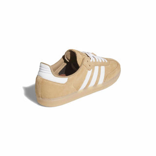 Beige sneaker with white stripes on a white background