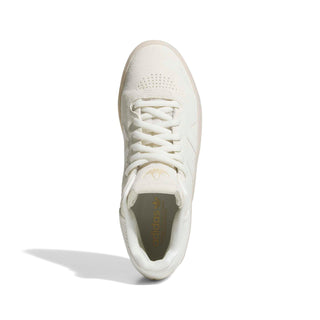adidas Skateboarding Tyshawn Shoes in Off White/Gold Metallic — Tyshawn Jones signature skate shoe with leather upper, Adituff toe reinforcement, Adiprene sockliner, and EVA midsole