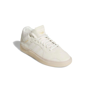 adidas Skateboarding Tyshawn Shoes in Off White/Gold Metallic — Tyshawn Jones signature skate shoe with leather upper, Adituff toe reinforcement, Adiprene sockliner, and EVA midsole
