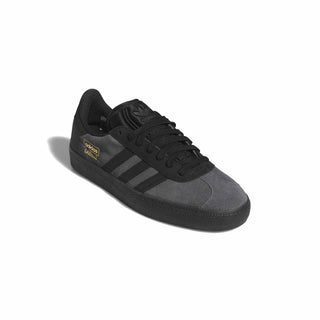 adidas Skateboarding Gazelle ADV Shoes in Dark Grey/Grey Six/Gold Metallic — iconic low-profile Gazelle silhouette with suede upper, reinforced ollie zone, and cupsole construction