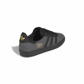 adidas Skateboarding Gazelle ADV Shoes in Dark Grey/Grey Six/Gold Metallic — iconic low-profile Gazelle silhouette with suede upper, reinforced ollie zone, and cupsole construction