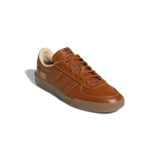 adidas Skateboarding Glenburn Shoes in Dusky Bronze/Gold Metallic/Gum — terrace-inspired skate shoe with leather upper, EVA heel cushioning, Three Stripes branding, and rubber outsole