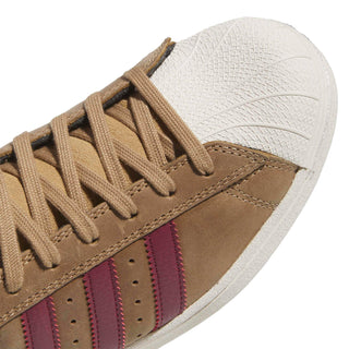 adidas Skateboarding Superstar ADV Shoes in Cardboard/Shadow Red/Gold Metallic — heritage shell toe silhouette with premium leather upper, flexible cupsole, and skate-reinforced stitching

