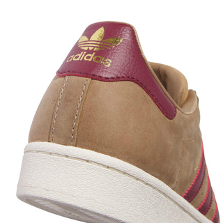 adidas Skateboarding Superstar ADV Shoes in Cardboard/Shadow Red/Gold Metallic — heritage shell toe silhouette with premium leather upper, flexible cupsole, and skate-reinforced stitching

