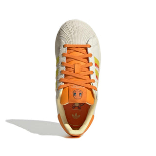 adidas Originals Pokémon Superstar II "Charmander" Kid's Shoes in Cream White/Shock Yellow/Bright Orange — Charmander tongue label and lateral side deboss, flaming 3-Stripes, coated leather upper with shelltoe, rubber outsole