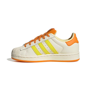 adidas Originals Pokémon Superstar II "Charmander" Kid's Shoes in Cream White/Shock Yellow/Bright Orange — Charmander tongue label and lateral side deboss, flaming 3-Stripes, coated leather upper with shelltoe, rubber outsole