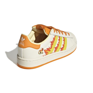 adidas Originals Pokémon Superstar II "Charmander" Kid's Shoes in Cream White/Shock Yellow/Bright Orange — Charmander tongue label and lateral side deboss, flaming 3-Stripes, coated leather upper with shelltoe, rubber outsole