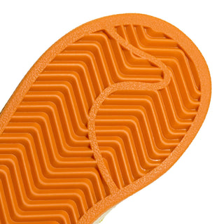 adidas Originals Pokémon Superstar II Elastic Lace "Charmander" Kid's Shoes in Cream White/Shock Yellow/Bright Orange — Charmander tongue label and lateral side deboss, flaming 3-Stripes, coated leather upper, elastic lace closure, rubber outsole