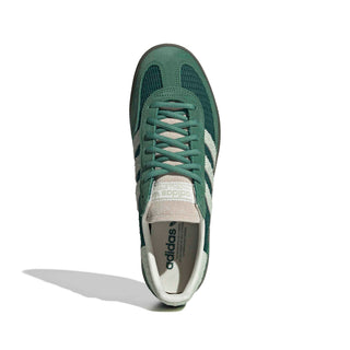 adidas Originals Handball Spezial in Collegiate Green/Linen Green — textile and mesh upper with suede overlays, snakeskin pattern detail, OG Spezial branding, and rubber outsole rooted in the 1979 heritage.