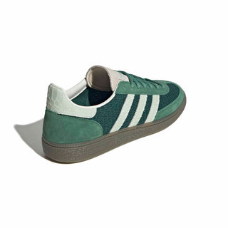 adidas Originals Handball Spezial in Collegiate Green/Linen Green — textile and mesh upper with suede overlays, snakeskin pattern detail, OG Spezial branding, and rubber outsole rooted in the 1979 heritage.