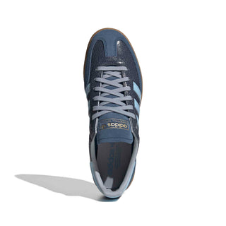adidas Originals Handball Spezial in Night Indigo/Clear Sky — cracked leather quarter with suede overlays, patent leather stripes, and soft gum rubber outsole rooted in the original 1979 design.

