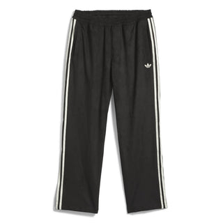 adidas Skateboarding Vintage Superfire Track Pant in Black and Cream White with loose fit and classic track styling.