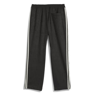 adidas Skateboarding Vintage Superfire Track Pant in Black and Cream White with loose fit and classic track styling.