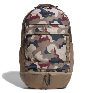 adidas Skateboarding FS+ Camo Backpack in Khaki Three/Khaki Six/Aurora Ink — 24.9L, recycled polyester, plain weave, zipper closure, bold camo design for skate and street