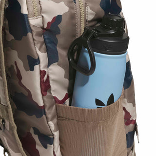 adidas Skateboarding FS+ Camo Backpack in Khaki Three/Khaki Six/Aurora Ink — 24.9L, recycled polyester, plain weave, zipper closure, bold camo design for skate and street