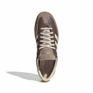 adidas Originals Handball Spezial in Earth Strata/Warm Vanilla — cracked leather quarter with suede overlays, soft gum rubber outsole, and iconic 3-Stripes in a warm, earthy colorway.

