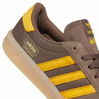 adidas Skateboarding Glenburn x Daewon Shoes in Earth Strata/Crew Yellow/Gum — leather and textile upper, rubber outsole with heel drop-in, lace closure, regular fit for skating and everyday wear