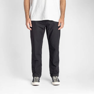 Roark Layover Pro Pants in Black with 4-way stretch and travel-focused features.