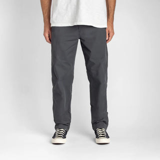 Roark Layover Pro Pants in Charcoal with stretch fit and ventilated back panel.