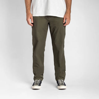 Roark Layover Pro Pants in Military green with stretch fabric and travel-ready features.