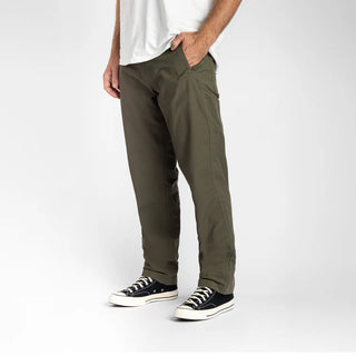 Roark Layover Pro Pants in Military green with stretch fabric and travel-ready features.