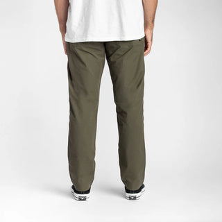Roark Layover Pro Pants in Military green with stretch fabric and travel-ready features.
